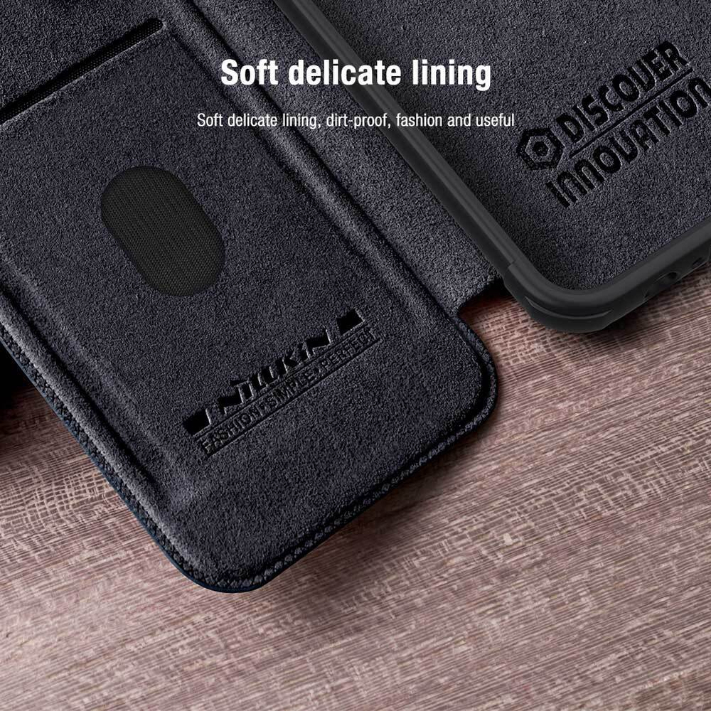 Кожаный чехол книжка от Nillkin для iPhone 15, серия Qin Pro Leather с защитной шторкой для камеры