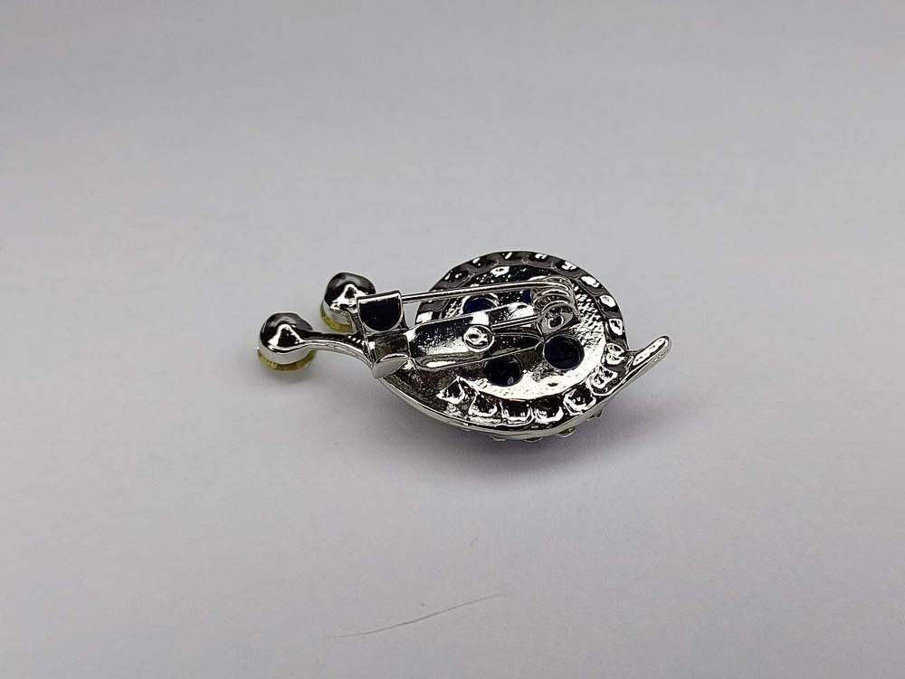 Брошка. Улитка. Глаз Фатимы. цвет " Серебро"