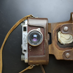 №13 Фотоаппарат "ФЭД-2" с объективом "Индустар - 62м" в оригинальном кофре с документом , металл, стекло, кожа, Харьковский машиностроительный завод им. Дзержинского (ФЭД), СССР, 1961-1979 гг.