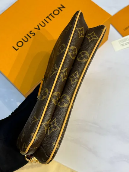 Сумка-клатч Louis Vuitton Liv, коричневый