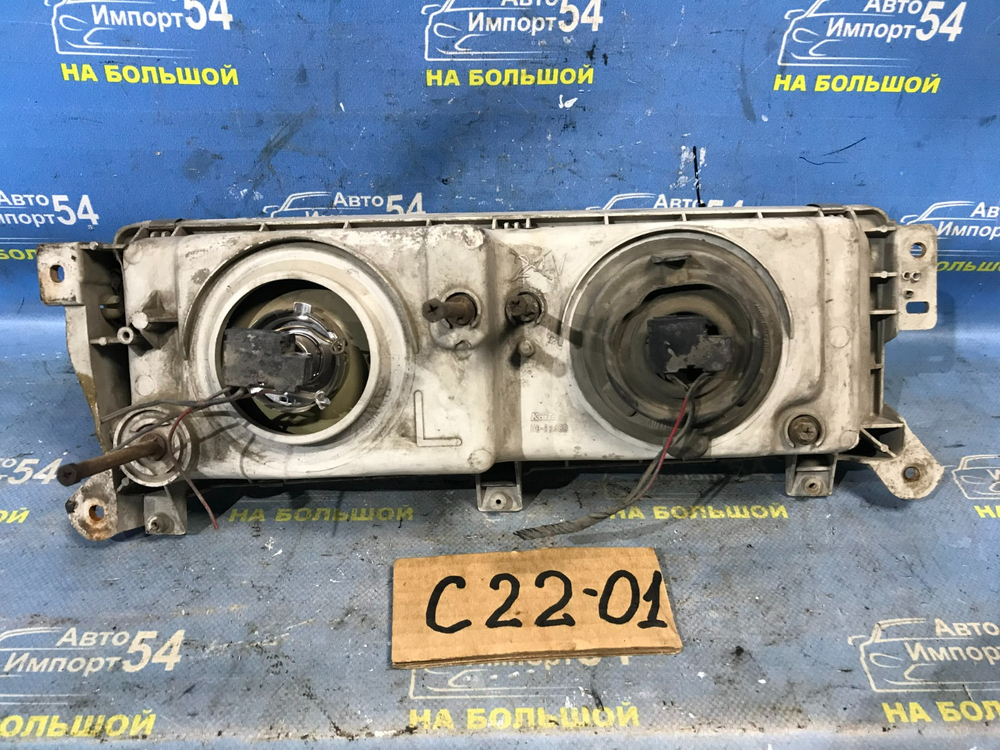 Фара передняя левая NISSAN LARGO 1992