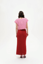 Розовая трикотажная кофточка