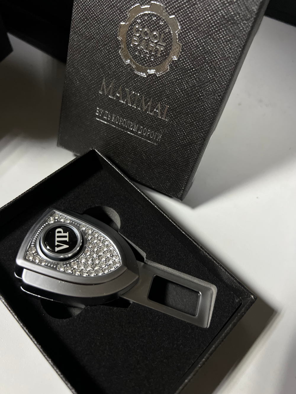 Заглушка ремня Coolpart" - "VIP" K-106VIP