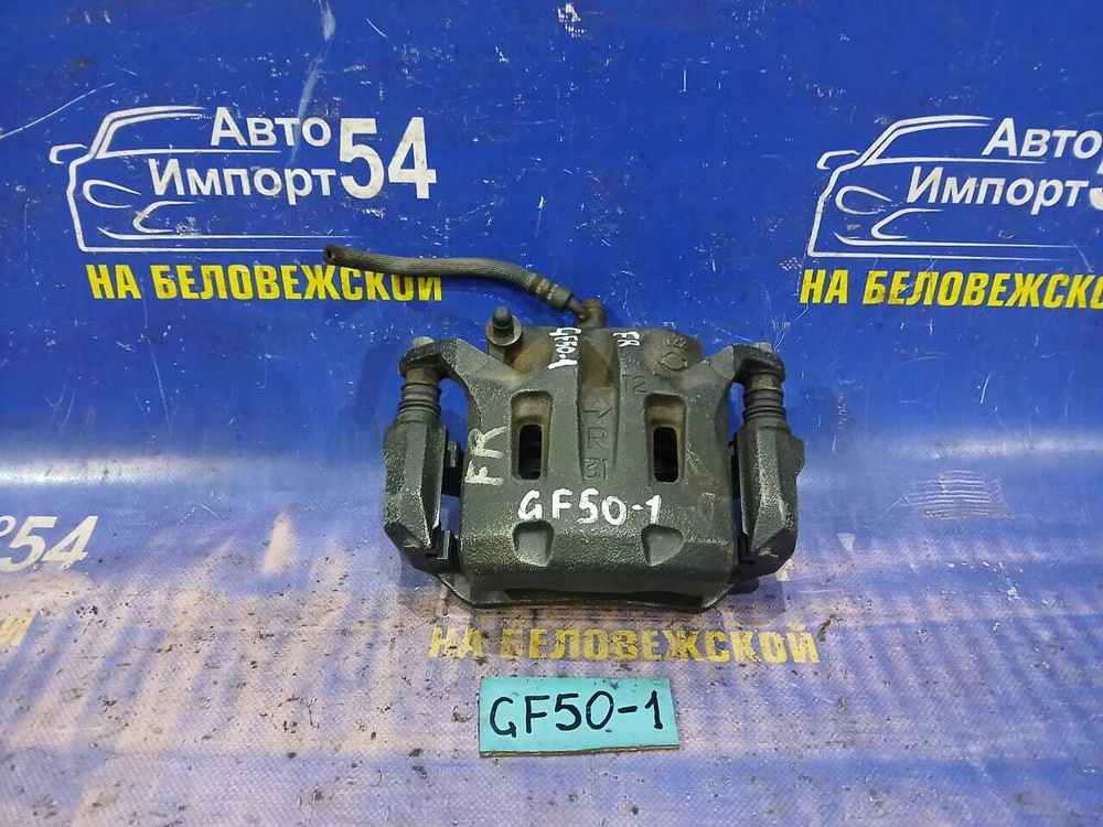 Суппорт тормозной передний правый NISSAN CIMA 2002