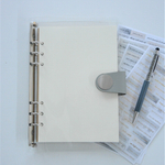 Обложка силиконовая (ПВХ) серая с хлястиком из кожзама и большой кнопкой, формат А5