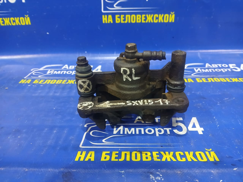 Суппорт тормозной задний левый TOYOTA SCEPTER 1994