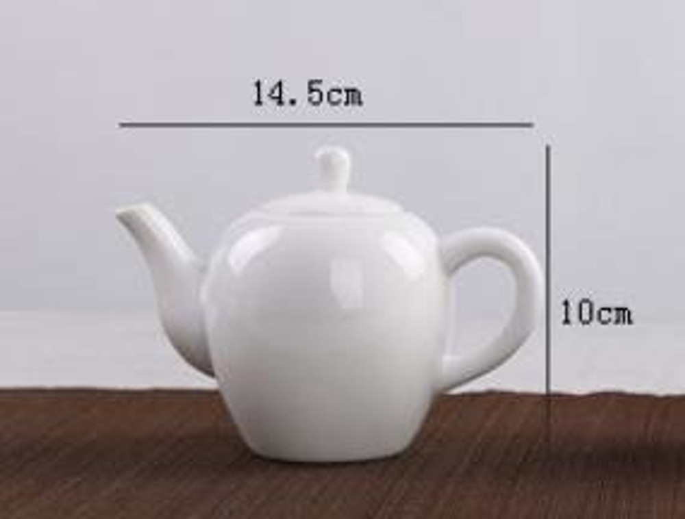 242062 Чайник, фарфор. Цвет белый. Объем 130мл. Размер 14см х 10см