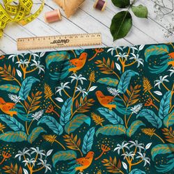 Ткань флис синие листья с оранжевыми птицами