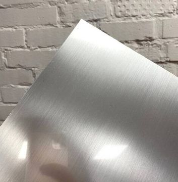 Пластик для гравировировки Laser 1,5х600х1200мм, серебро царапанное/черный