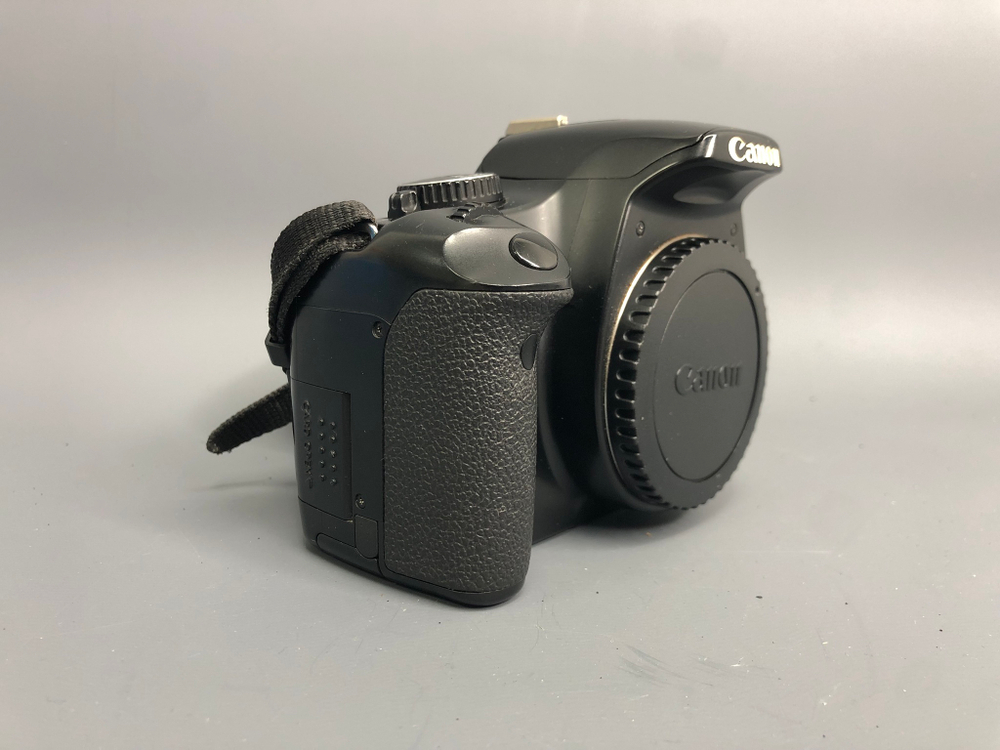 Canon EOS 450D 23.600 кадров
