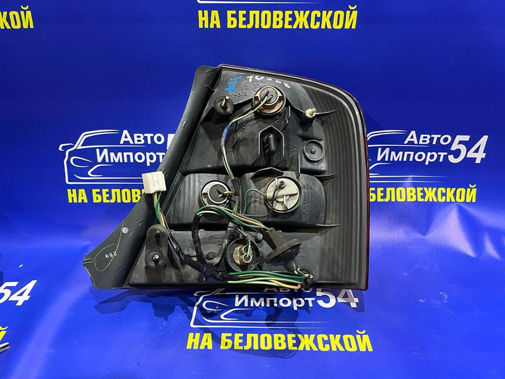 Стоп левый MAZDA FAMILIA 2000-2003