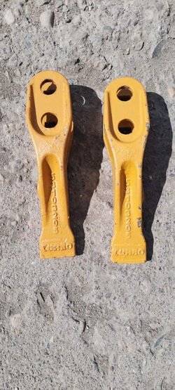 Зуб центральный E25 53103205