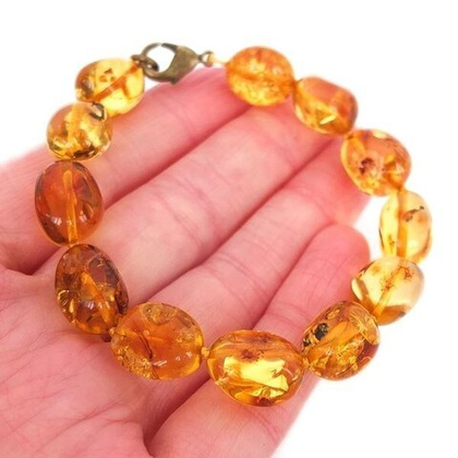 Браслет из янтаря орешки золотистые (5708)