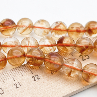 "Цитрин" бусины (кварц), диаметр около 9,6-9,7 мм, цена за 10 шт (1/4 нити)