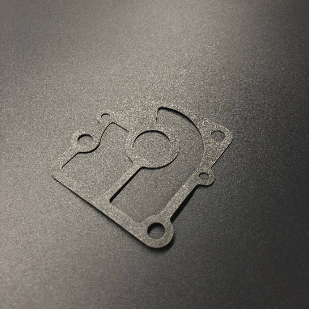 Прокладка под пластину помпы охлаждения Tohatsu 9.9-18/Mercury 9.9-18 (3FS-65029-0; 20F-06.00.00.08;