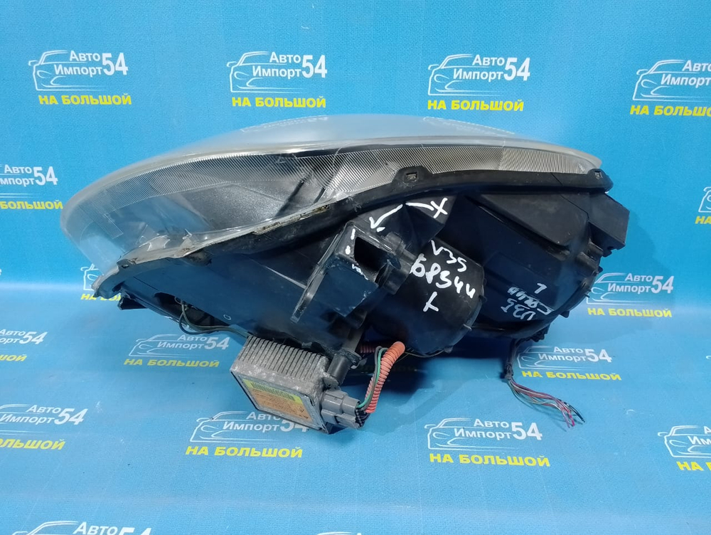 Фара передняя левая NISSAN SKYLINE 2001-2004