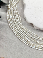 Натуральный барочный жемчуг супермелкий 1,5-2 мм, кремовый, нить 18 см