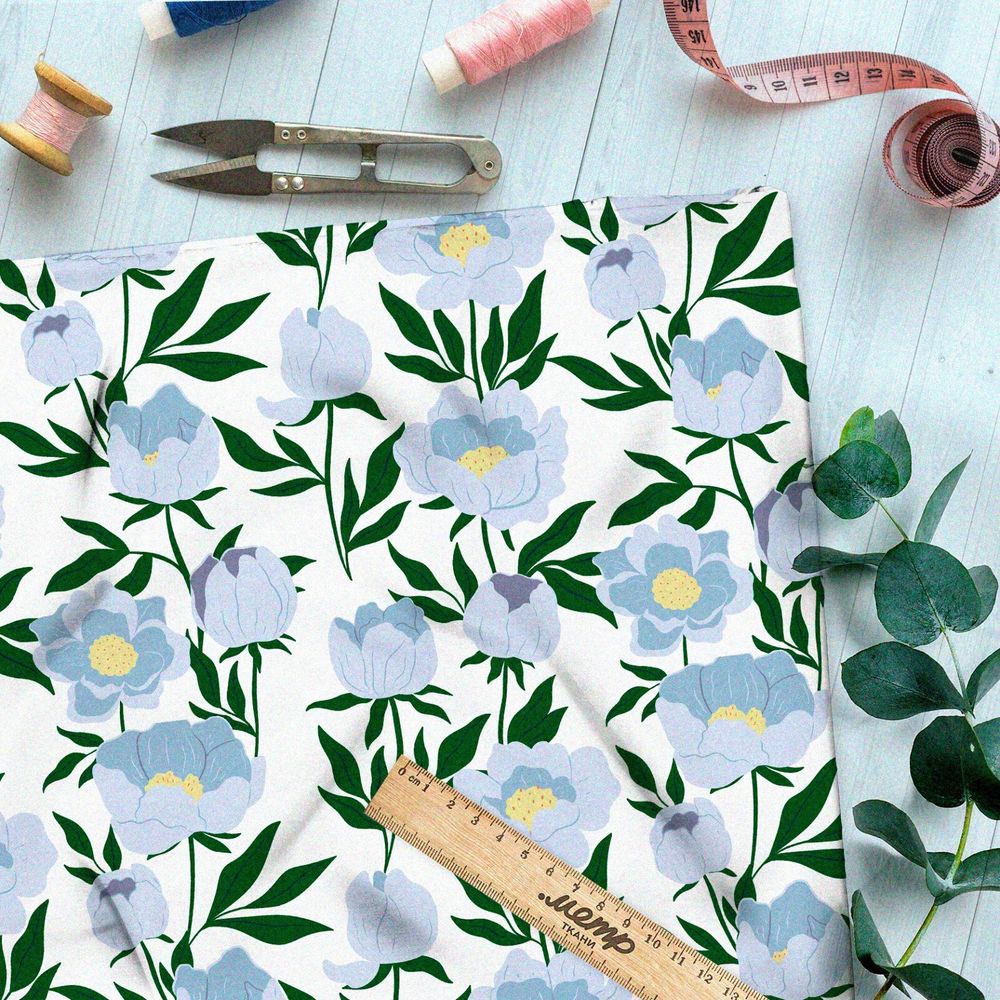 Ткань барби бледные голубые цветы с тёмно-зелёными листьями