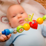 Растяжка на кроватку или коляску Клубничка, Вальда