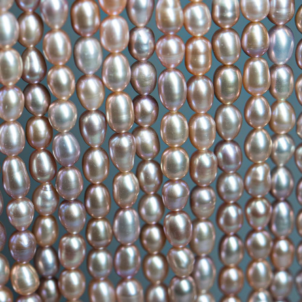 Жемчуг культивированный овальный A Grade, розово-лиловый, 5*6-8,5мм