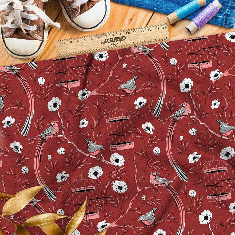 Ткань бифлекс мелкие снегири, цветы и птичьи клетки на бордовом фоне