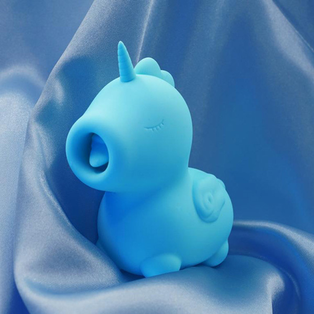 Голубой клиторальный вибромассажер 11см с подвижным язычком Острый Языкатый Unihorn Mount'n Peak UNIMP