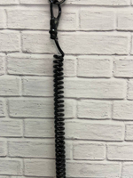 Страховочный тренчик для оружия