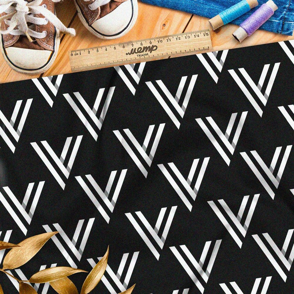 Ткань оксфорд 210 белый треугольный узор на чёрном фоне