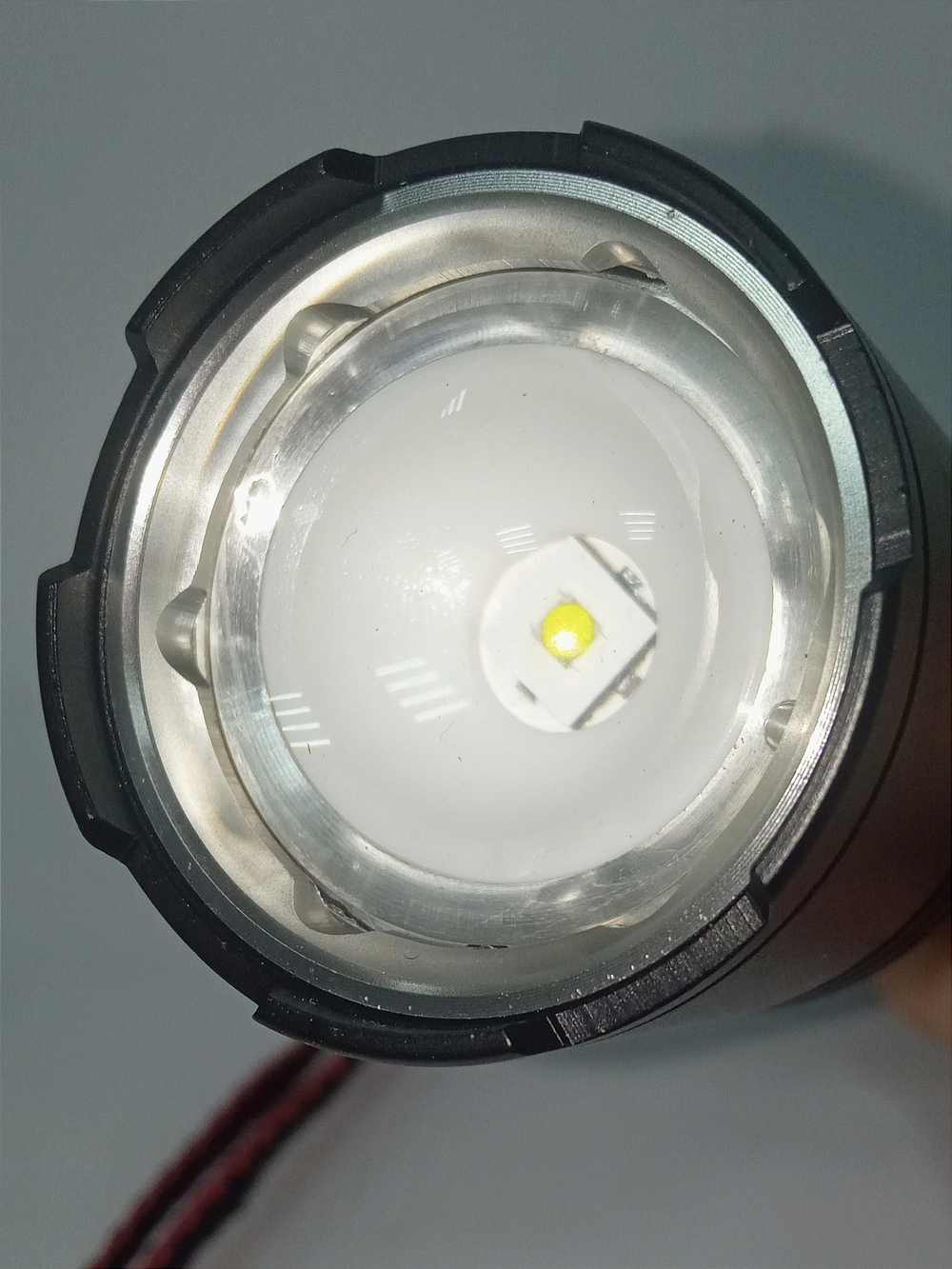 Фонарь ручной высокой яркости "белый лазер" NGY HYD2207-TG