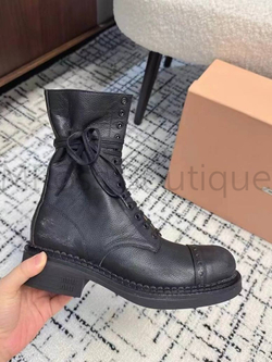 Женские сапоги Miu Miu в черном цвете