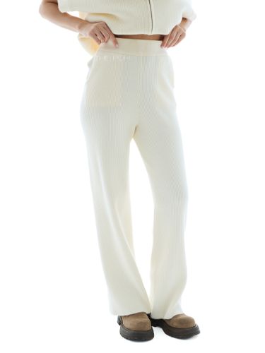 Молочный трикотажный костюм с жилетом