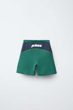 ZARA ШОРТЫ ИЗ МЯГКОЙ ТКАНИ С ПРИНТОМ PRINCE ®, ЗЕЛЕНОВАТО-СИНИЙ