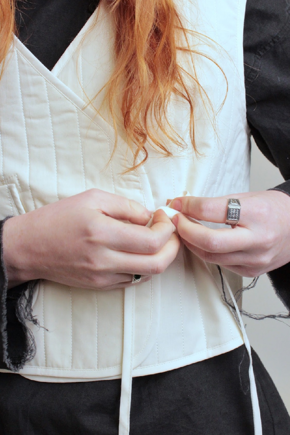 Жилет стеганый на запах из молочного хлопка