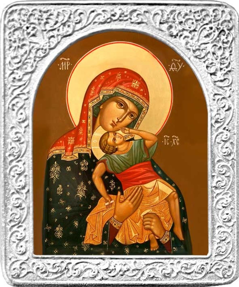 Взыграние младенца. Маленькая икона Божьей Матери в серебряной раме.
