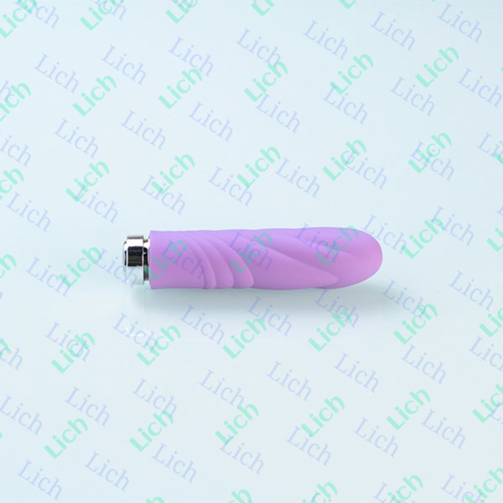 Сиреневый вибромассажер с волнистой поверхностью Charms Key