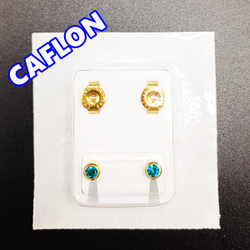 Серьги-гвоздики для прокола ушей под пистолет. CAFLON (Англия). Золотистые с бирюзовыми ( Декабрь) кристаллами