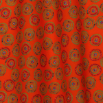 Шелковистый хлопок ярко-оранжевого цвета с набивным рисунком