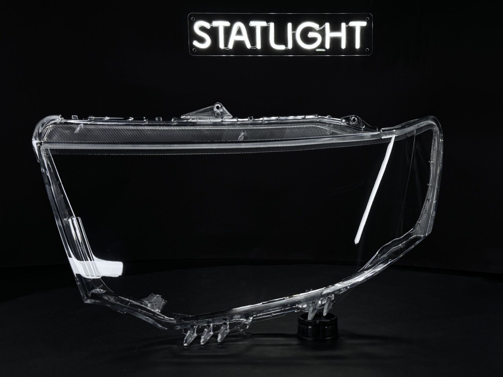 Левое стекло фары Mitsubishi Pajero Sport 2008-2016