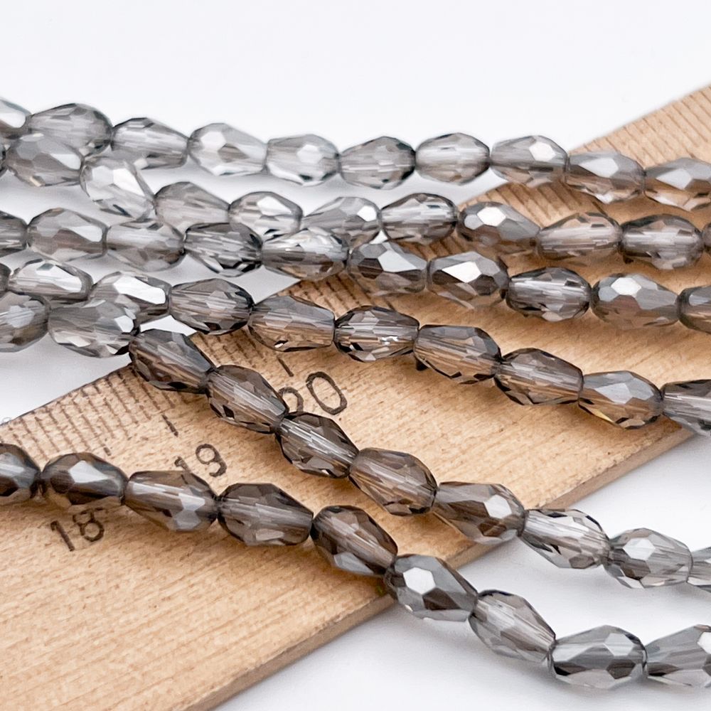 Бусина Капля, стекло, цвет серый, размер около 6,5*4,4 мм, цена за отрезок 19 см (1/2 нити)