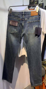 Джинсы Prada
