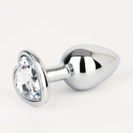 Серебристая анальная пробка с прозрачным кристаллом в форме сердца - 7 см. (Цвет: серебристый)