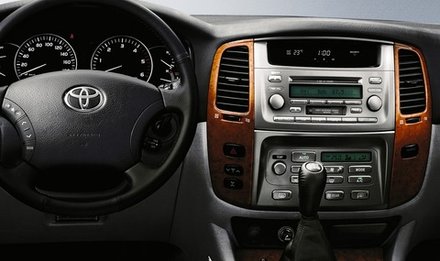 Магнитола для Toyota Land Cruiser 100, Lexus LX470 2002-2007 (экран климата снизу) - Carmedia OL-1698 QLed+2K, Android 12, ТОП процессор, CarPlay, 4G SIM-слот