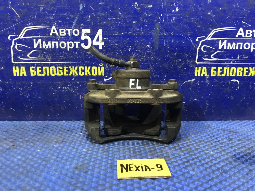 Суппорт тормозной передний левый DAEWOO NEXIA 2011