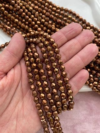 Нить бусин из гематита 6мм, огранка