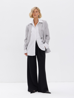 Широкие демисезонные брюки-палаццо со складками