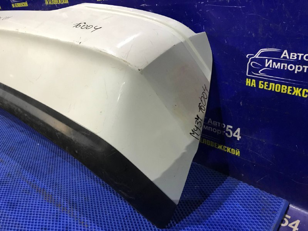 Бампер задний NISSAN CEDRIC 1999-2004