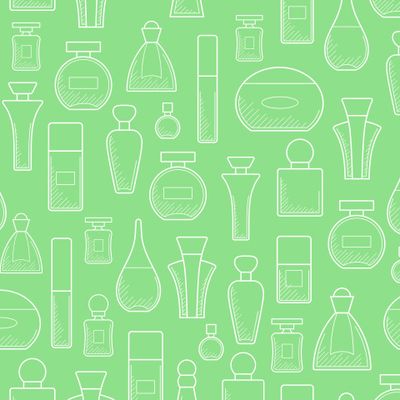 Парфюмерия на зеленом фоне