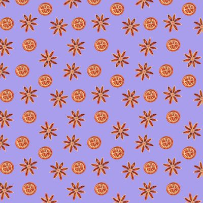 Апельсин и анис на фиолетовом фоне