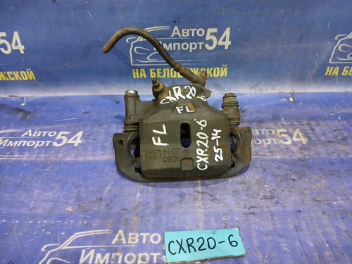 Суппорт тормозной передний левый TOYOTA ESTIMA 1992