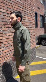 Куртка олива со скрытым капюшоном